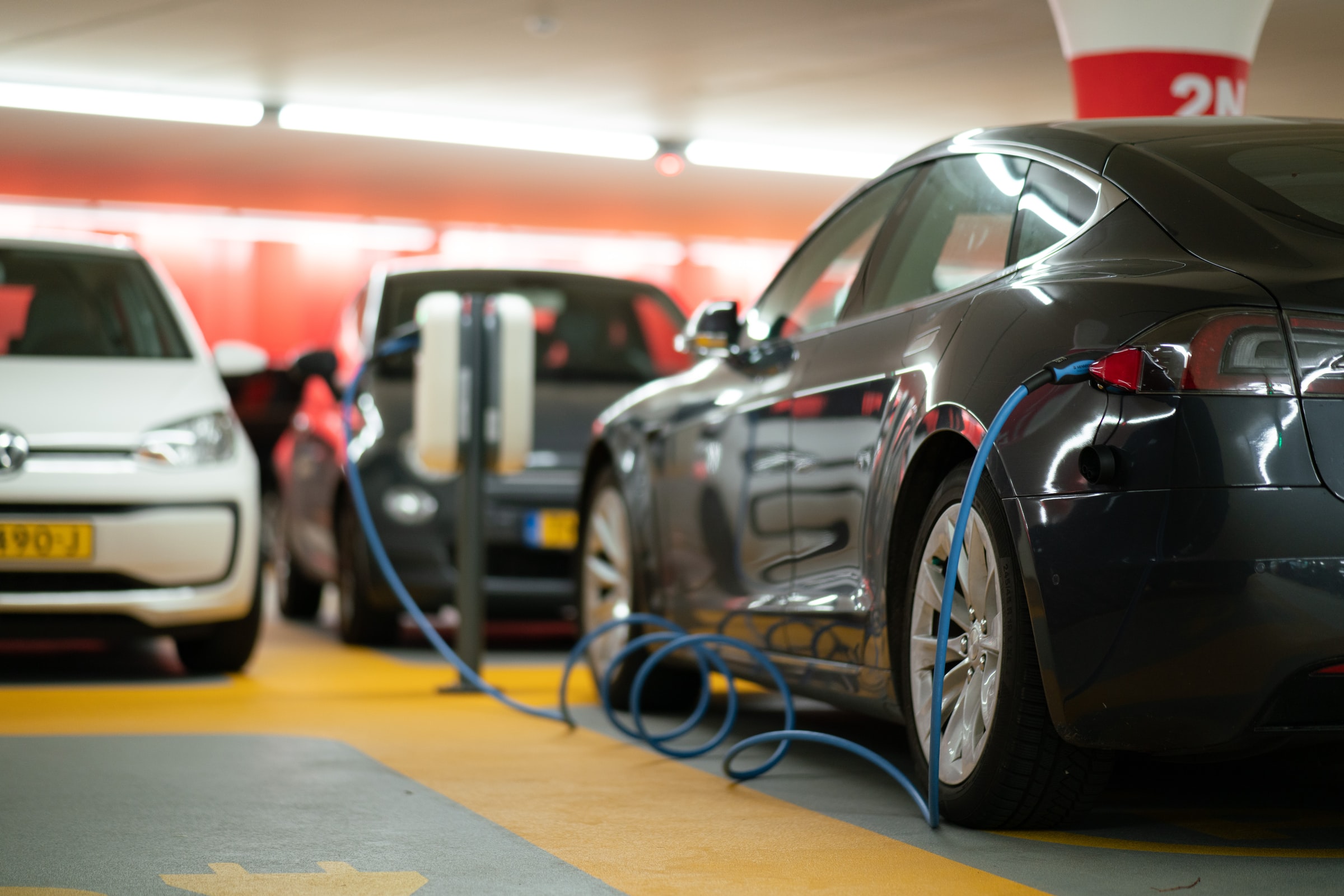 Long-Term Parking for Electric Vehicles: Tips to Keep Your EV Safe & Charged During Your Trip