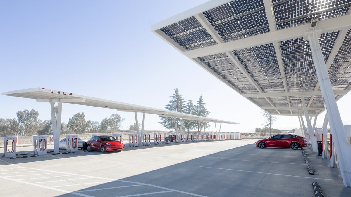 Teslas charging via energy producting by solar panels