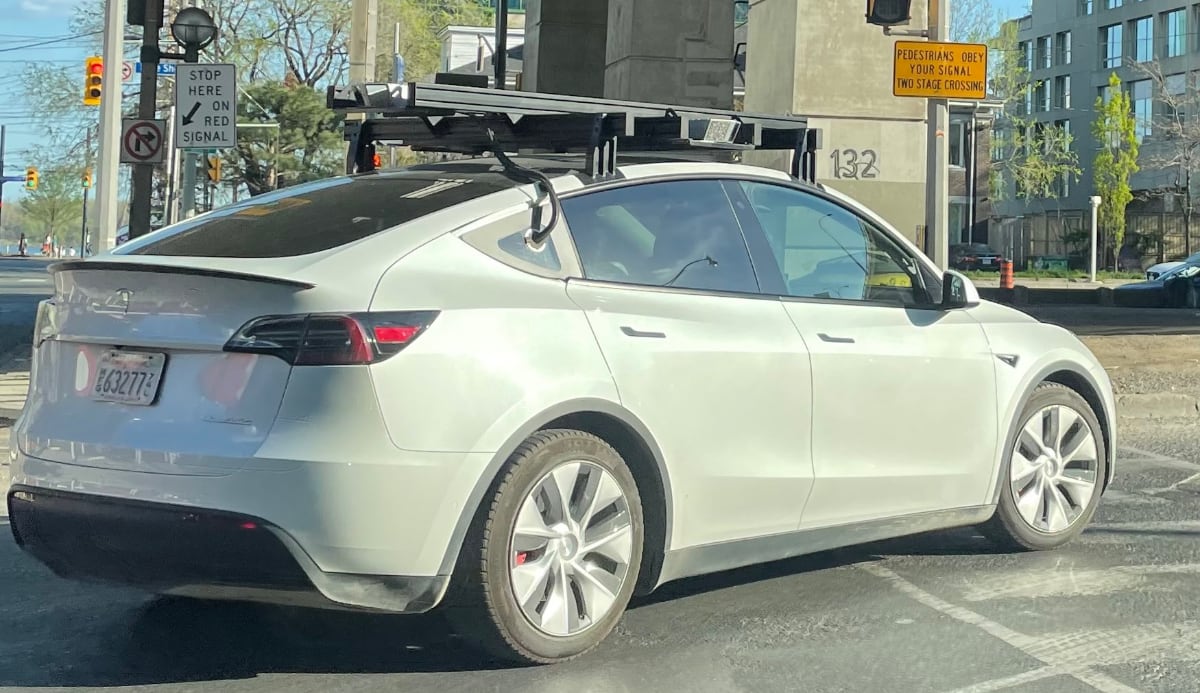 A Tesla vehicle equipped with LiDAR sensors