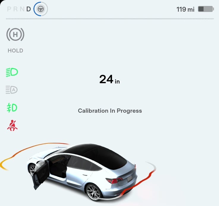 The blue ring around the Autopilot icon will show you the progress of your camera calibration