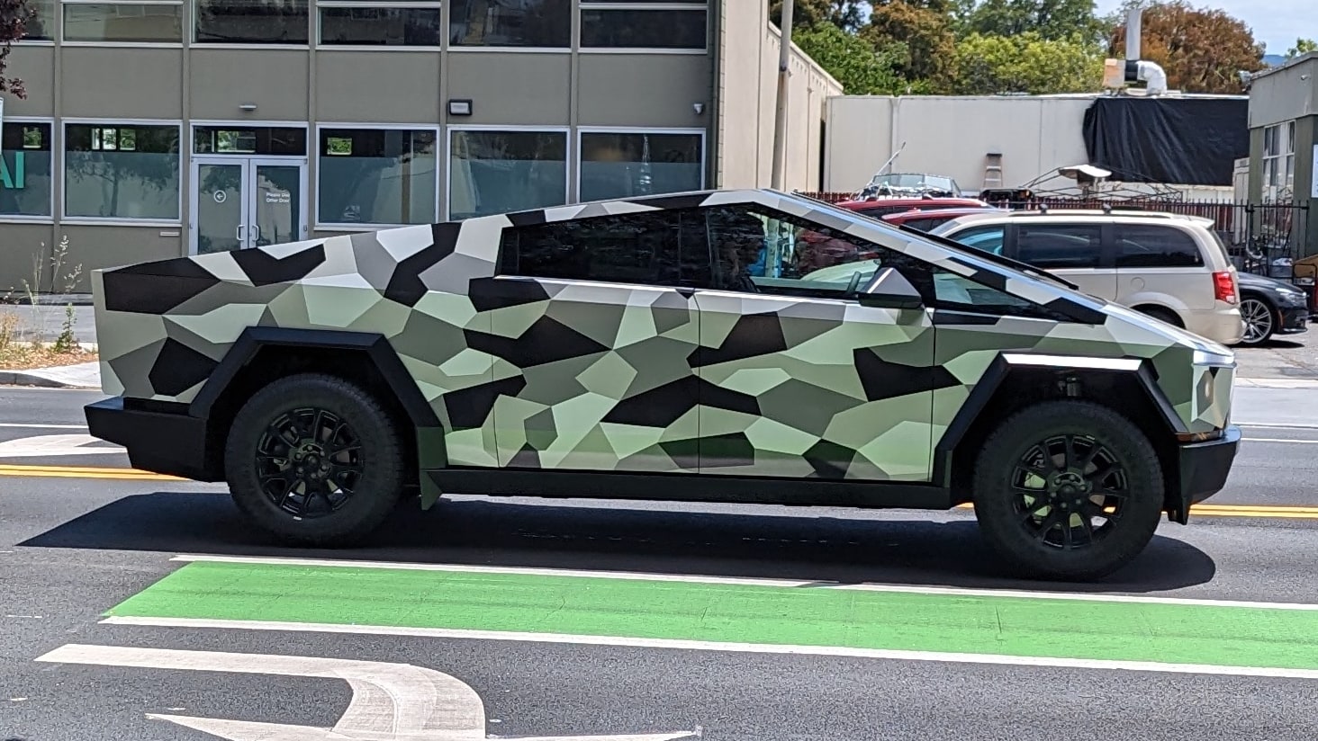 A camo-wrapped Cybertruck