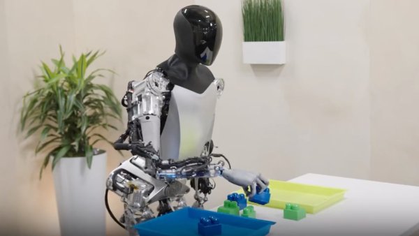 An In-Depth Look at How Tesla's Optimus Learns: Digital Dreams and AI Simulation