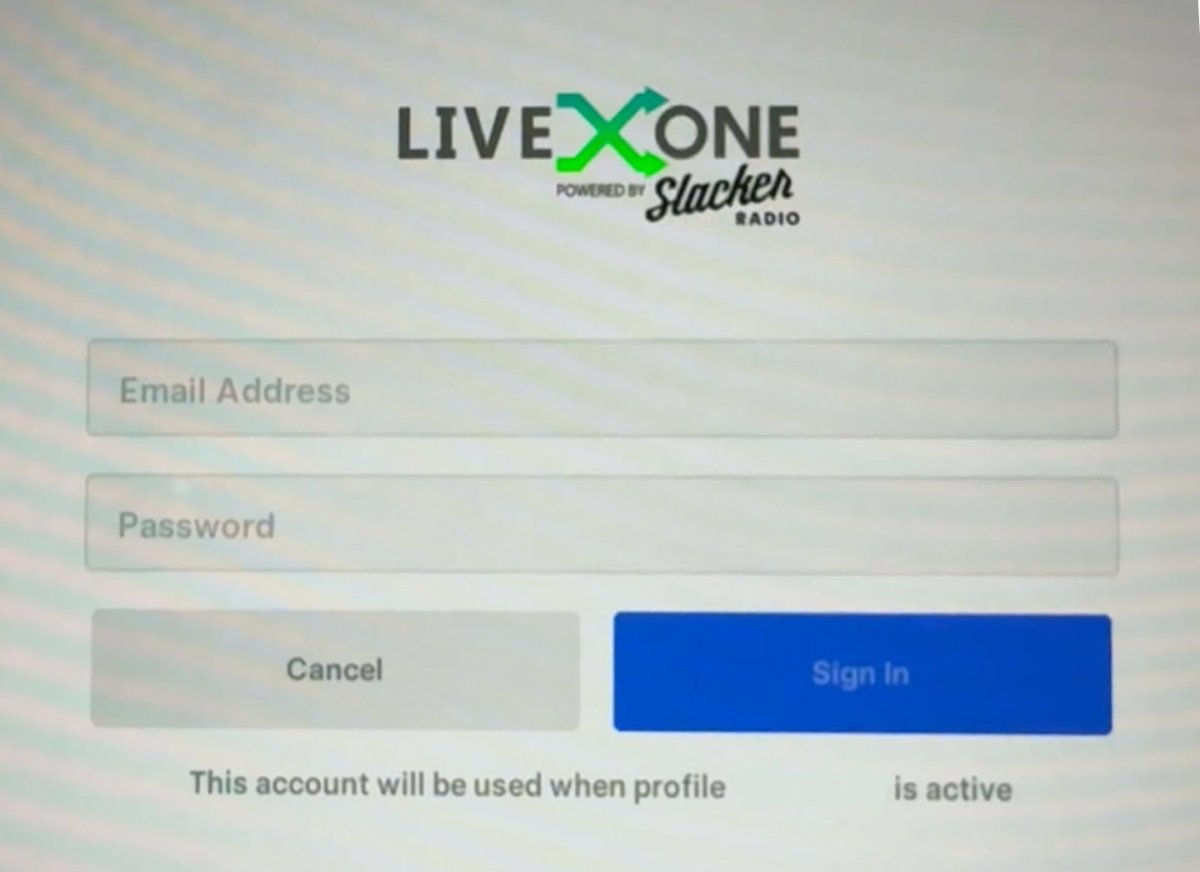 The LiveOne login screen in a Tesla