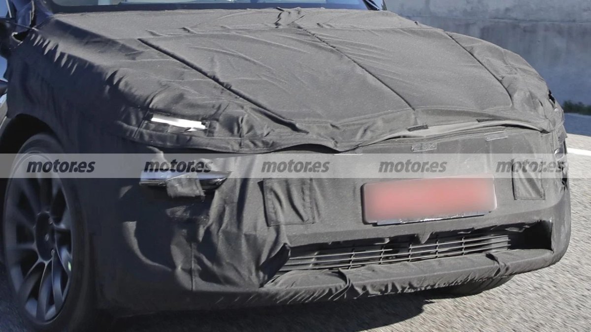 Look at the center of the grill area, you'll note a tell-tale bump for the camera housing.